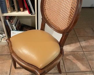 Antique cane chair with soft leather seat $125