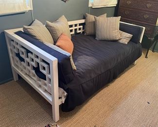 Contemporary sofa daybed. Has twin mattress only used once. Navy blue cover. 6.5' x 3.5'. $400