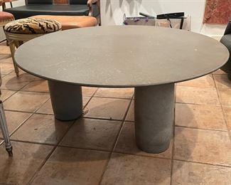 Cement coffee table $850 4' diameter x 1'7" tall. Has 3 legs.