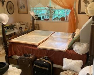 4 poster bed with nature prints.