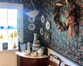 English corner cabinet with tile backsplash and marble top 