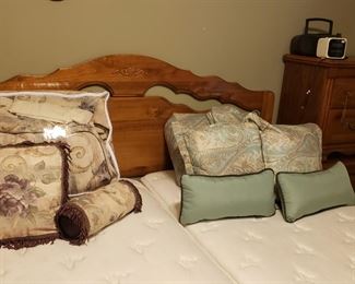 Wooden king size headboard, Spring Air electric adjustable king bed (two twins), oak bedside tables, comforters