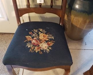 Carved wooden chair w/needlepoint seat