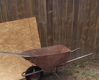 Rusty wheel barrow