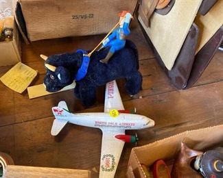 TOY PLANE AND BULL RIDER