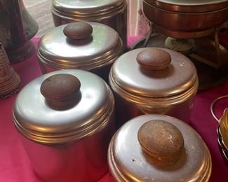 Set of vintage Mirro aluminum copper rose color canisters - set of five.