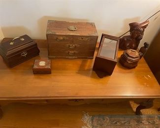 Small wooden boxes and wooden coffee table.