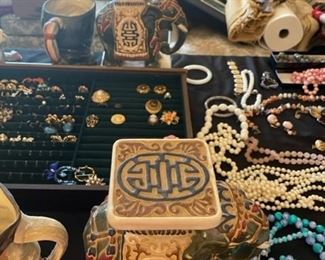 Costume jewelry and pair of small elephants.