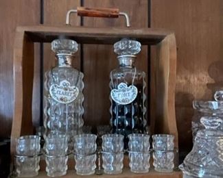 Several nice decanter and bar sets.