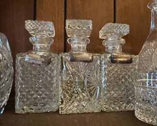Several nice decanter and bar sets.