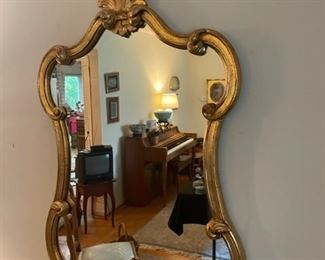 Gilded mirror.