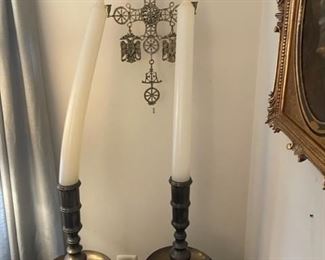 Large brass candlestick holders.