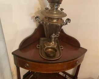 Corner table and Samovar antique brass.