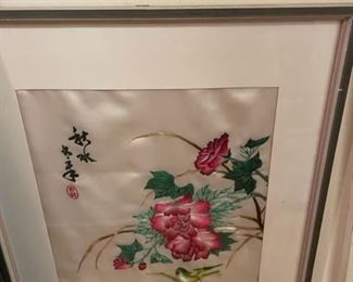 Embroidered art work.