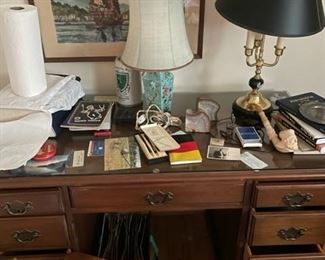 Desk/chair, lamps and office supplies.