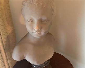 Chalkware bust of girl on stand.