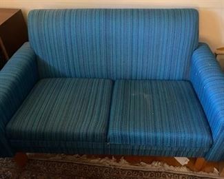 Mid-century blue striped love seat.