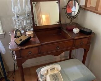 Vanity table with stool.