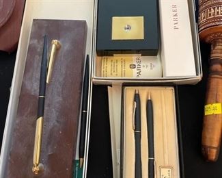 Cross and Parker pen sets.