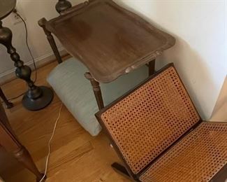 Magazine holder, end table and floor lamp.