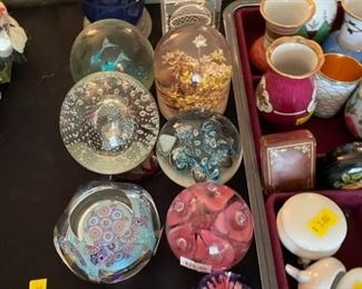 Glass paperweights.