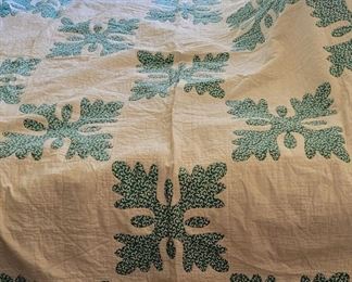 One of two vintage quilts. Circa 1940s Oak Leaf pattern