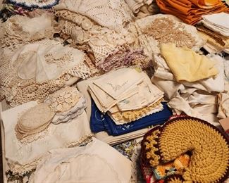 Some of the many vintage doilies and other vintage linen items. 