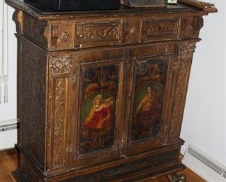 One of a pair of Italian Baroque polychromed cupboards, c late 17th C; both having the inscription "Multum in Parvo" (translates to "much in little")