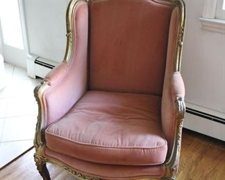 One of a pair of 19th c upholstered bergere chairs