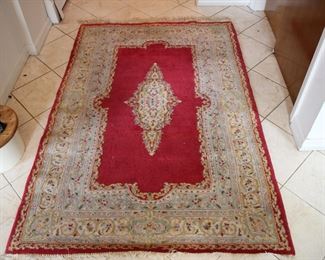 Hand woven area rug