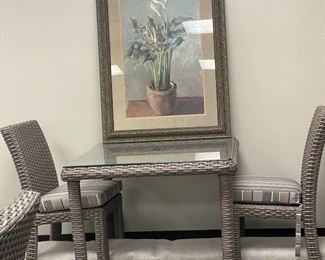 All weather wicker table (glass top has opening for umbrella, plus 4 chairs