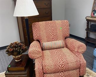 Cheetah print recliner, decorative boxes