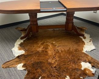 Hide rug, dining table, poker table combination