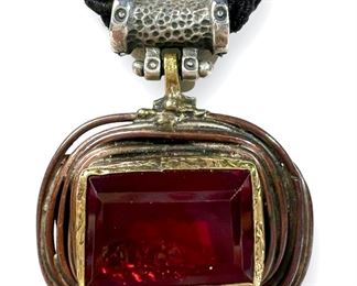 Artisan Sterling Silver Red Stone Pendant on Black Corded Necklace.

