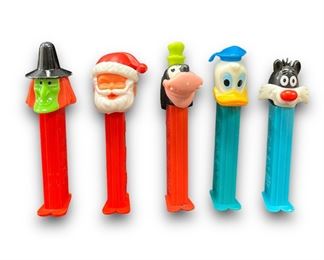 Lot of 11 Vintage Pez Dispensers with original vintage candy in package
