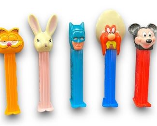 Lot of 11 Vintage Pez Dispensers with original vintage candy in package
