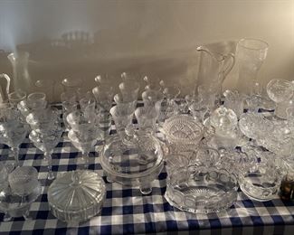 There is also this glassware set.    There are several tables of Depression-era glassware in the sale.  
