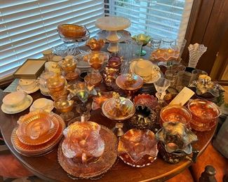There are several serving dishes on this table.  