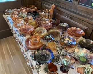 Another table of decorative serving pieces.  Are there any Depression glass pieces here?  Come take a look!