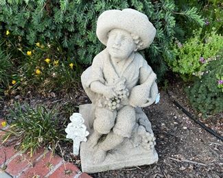 Don't forget this little statue, perfect for the garden.