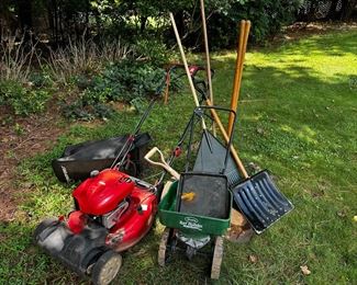 Troy built lawnmower, spreader and yard hand tools