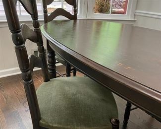 Vintage oval narrow kitchen dining set with 4 green velet chair seats - well loved piece of furniture.