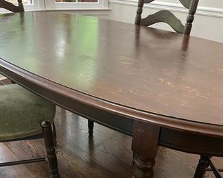 Vintage oval narrow kitchen dining set with 4 green velet chair seats - well loved piece of furniture.