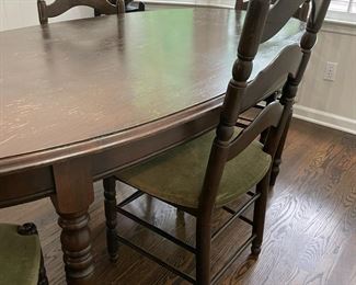 Vintage oval narrow kitchen dining set with 4 green velet chair seats - well loved piece of furniture.