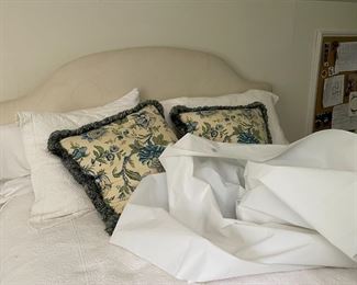 Upholstered queen bed (mattress included if interested)