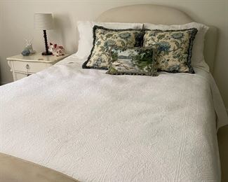 Upholstered queen bed (mattress included if interested