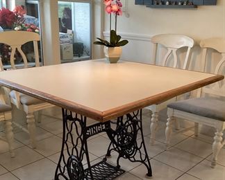 Kitchen table top with Singer sewing machine base