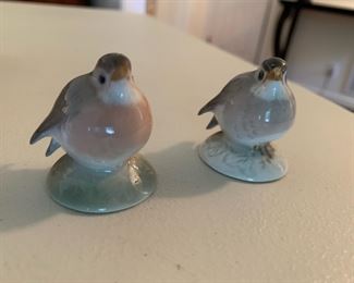 Two little fat birds.