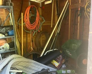 Garden Shet full of garden tools, supplies, electric blower and more