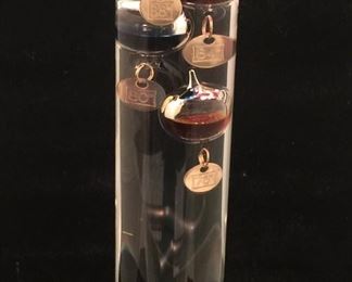 A Galileo thermometer is a colorful and artistic way to show the temperature. 